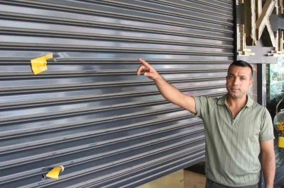 Adana’da iş yeri iki defa kurşunlandı: &quot;El bombası attıracağım&quot; diyerek haraç istemeye başladılar
