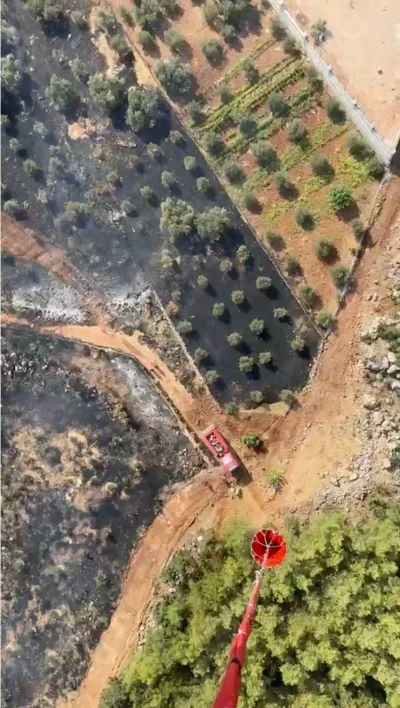 Antalya&rsquo;da ormanlık alanı tehdit eden yangın
