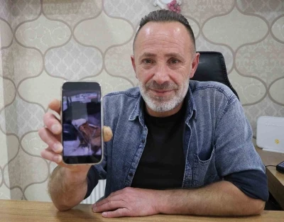 Aracın bagajındaki buzağıyı g&ouml;r&uuml;nce merakla yaklaştı, g&ouml;rd&uuml;ğ&uuml; manzara karşısında şaşkınlığını gizleyemedi
