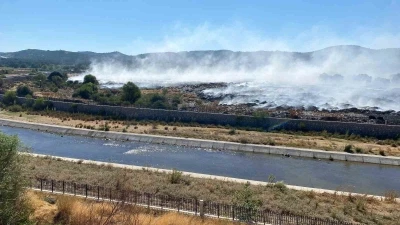 Ayvacık ilçesinde çöplükte başlayarak ormanlık alana sıçrayan yangın büyük ölçüde kontrol altına alındı
