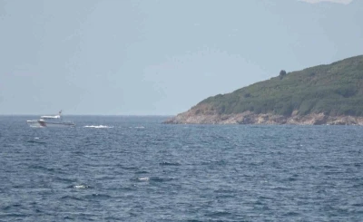 Ayvalık&rsquo;ta denizde kaybolan genci arama &ccedil;alışmaları aralıksız s&uuml;r&uuml;yor
