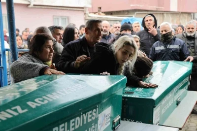 Babalarının &ouml;ld&uuml;rd&uuml;ğ&uuml; kardeşler yan yana toprağa verildi
