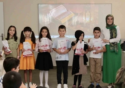 Bilgi evi öğrencilerine Kur’an’a geçiş töreni düzenlendi
