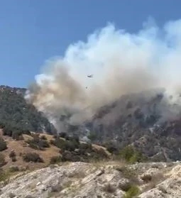 Buldan’da yangını söndürmek için bölgede bulunan dozer operatörü yaralanarak hastaneye kaldırıldı
