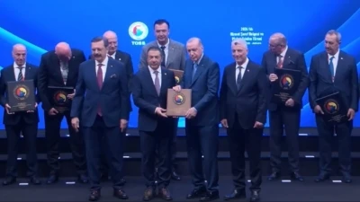 Cumhurbaşkanı Erdoğan&rsquo;dan DTO Başkanı Erdoğan&rsquo;a &lsquo;Hizmet Şeref&rsquo; plaketi
