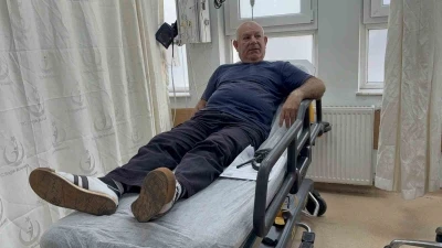 Darbedilen kadını kurtarmak isterken kendisi saldırıya uğradı
