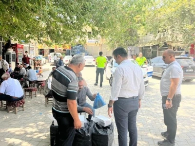 Dicle Kaymakamı Atış, İlçe Emniyet Amiri Özkan ile birlikte esnafı ziyaret etti
