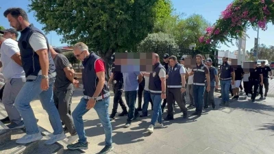 Fethiye&rsquo;deki g&ouml;&ccedil;men ka&ccedil;ak&ccedil;ılığı operasyonunda 9 tutuklama

