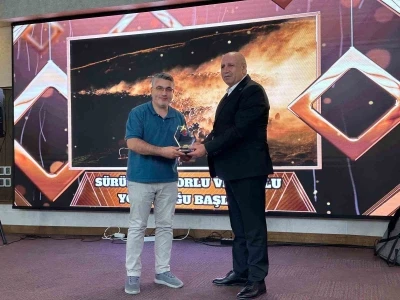 İHA muhabiri Özkan Olcay, birincilik ödülünü aldı
