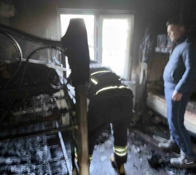 İzinli itfaiyeci yangına m&uuml;dahale etti
