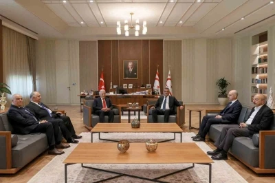 KKTC Cumhurbaşkanı Erh&uuml;rman, TDT Aksakallar Konseyi Başkanı Binali Yıldırım ile g&ouml;r&uuml;şt&uuml;
