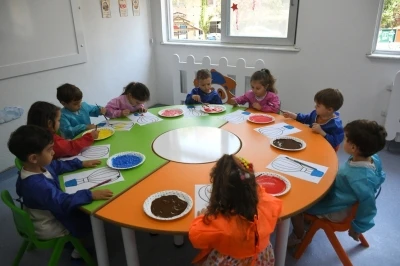 Kuşadası&rsquo;ndaki &Ccedil;ocuk Gelişim Merkezi yazın da hizmet vermeye devam ediyor
