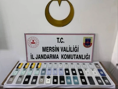 Mersin&rsquo;de 800 bin liralık g&uuml;mr&uuml;k ka&ccedil;ağı telefon ele ge&ccedil;irildi
