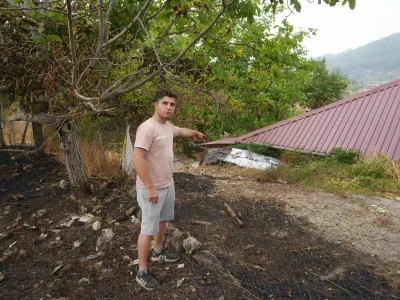 Orman yangının sıçradığı köydeki hasar görüntülendi: Evler metreler kala kül olmaktan kurtarılmış
