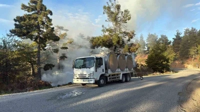 Orman yangınında alevlere sütle müdahale etti
