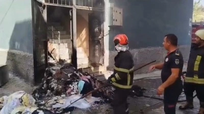 Paniğe neden olan ev yangını kısa sürede söndürüldü