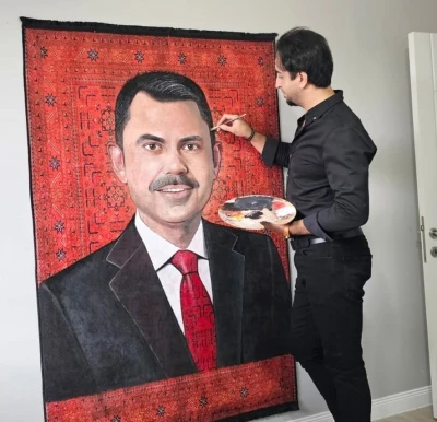 Ressam &ccedil;ift, Bakan Kurum&rsquo;u halıya resmetti
