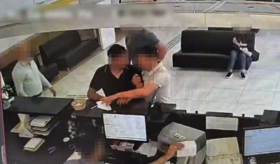 Ş&uuml;pheli, dolandırıcılık parasını &ccedil;ekerken su&ccedil;&uuml;st&uuml; yakalandı
