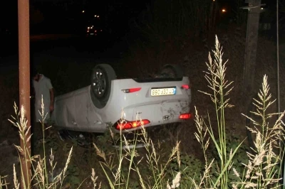 Takla atan araçtan burnu kanamadan çıktılar
