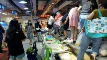 Çin'de yeni vakalar arttı, halk marketlere hücum etti