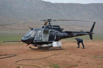 Kesintisiz enerji için helikopterle bakım onarım yapılıyor
